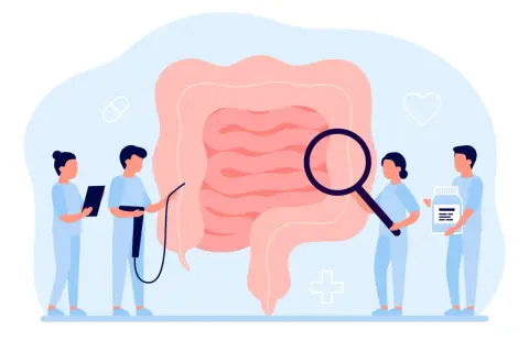 Medici esaminano un intestino ingrandito, simbolo di diagnosi e cura per la colite ulcerosa. Uno tiene una pillola, un altro una bottiglia di farmaci.