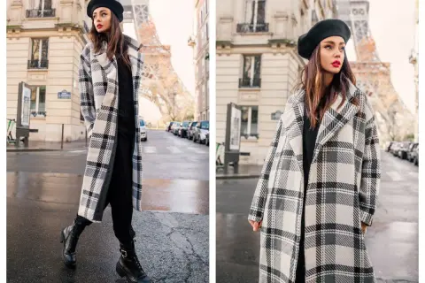 Elegancki płaszczyk plus size w kratę, idealny na paryski spacer. Kobieta w beretce i długim płaszczu na tle Wieży Eiffla.