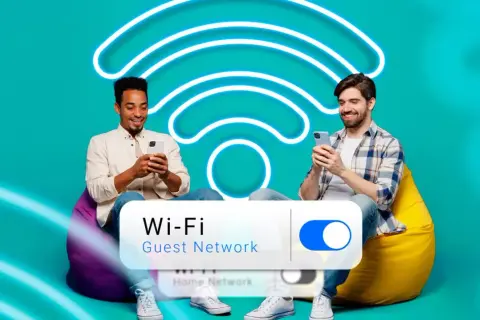 Deux hommes souriants sur des poufs, utilisant leurs téléphones. Un grand symbole Wi-Fi lumineux et un interrupteur "Wi-Fi Guest Network" sont visibles.