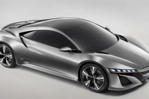 Srebrny, futurystyczny Honda NSX z ostrymi liniami i sportowymi felgami, gotowy do podboju dróg.