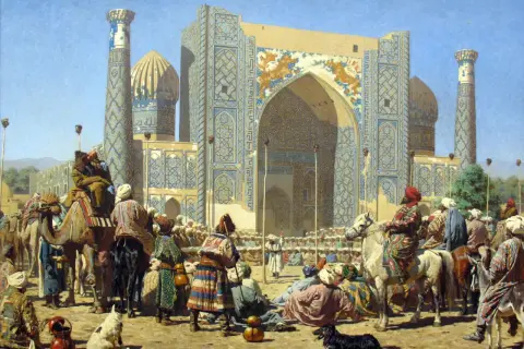 Scena z bazaru w Azji Środkowej, z ludźmi w barwnych strojach, wielbłądami i koniami przed ozdobnym budynkiem. To przykład orientalizmu co to.