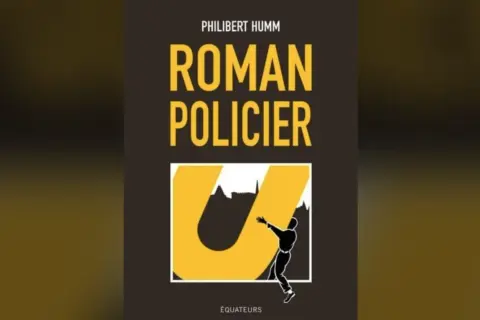 Couverture d'un roman policier de Philibert Humm. Une silhouette noire escalade un grand "U" jaune devant un paysage urbain stylisé.