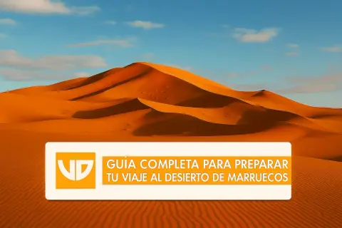Dunas doradas bajo un cielo azul. Guía completa para preparar tu viaje al desierto de Marruecos, de Marrakech a Merzouga.