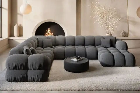 Gemütliche graue Velourcouch, die zum Entspannen einlädt. Tipps zur velourcouch reinigen für ein frisches Wohngefühl.