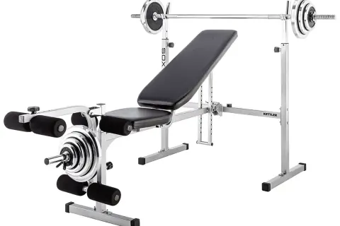 Hantelbank mit Langhantelablage und Beinbeuger-Zubehör für ein komplettes Workout zu Hause.