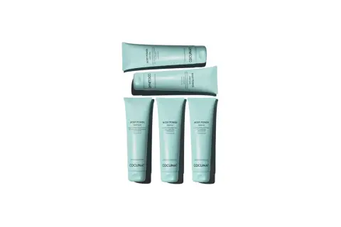 Cinco tubos de gel "Body Power" de Cocunat, dos apilados y tres en fila, listos para potenciar tu figura.