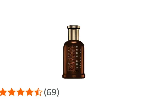Elegancka butelka perfum Hugo Boss Oud Saffron o bogatym, brązowym odcieniu.