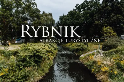 Rybnik: malowniczy strumień wśród zieleni, zapraszający do odkrywania jego atrakcji turystycznych.