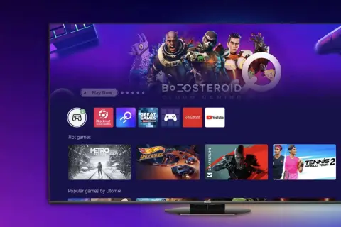 Ekran telewizora vidaa z grami w chmurze. Widoczne ikony aplikacji, gry "Metro Exodus", "Hot Wheels Unleashed" i "Tennis 2 World Tour".
