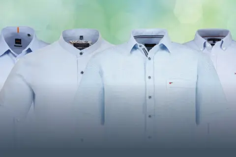 Vier hellblaue Hemden mit verschiedenen hemdkragen arten: Kent-, Steh- und Button-Down-Kragen.
