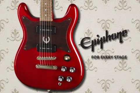 Rote Epiphone Coronet E-Gitarre mit braunem Schlagbrett und dem Epiphone-Logo. Perfekt für jede Bühne.
