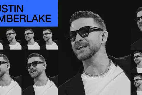 Justin Timberlake w Polsce, śpiewający na scenie w okularach i naszyjniku.