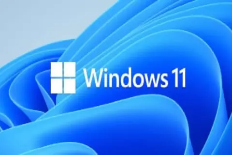 Logo de Windows 11 sobre fondo azul ondulado. Averigua cuanto cuesta instalar Windows 11 y renueva tu sistema.