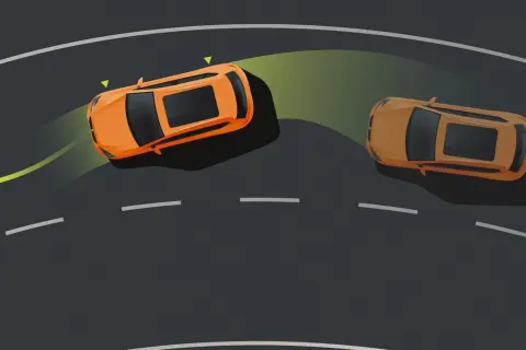 Dos coches naranjas en una curva. Uno, con ASR auto, se desliza ligeramente, indicado por una flecha amarilla.