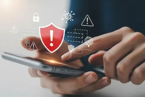 Ochrona telefonu przed wirusami. Ikony symbolizują bezpieczeństwo, zagrożenia i ochronę danych.