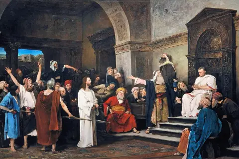 Piłat, pytany kto skazał Jezusa na śmierć, wskazuje na tłum. Jezus stoi po lewej.
