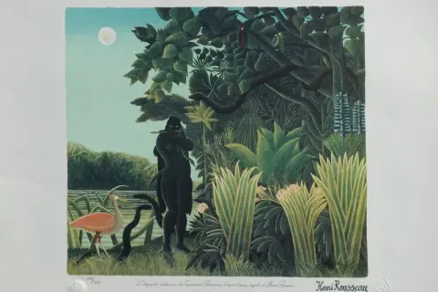 A dark figure plays a flute to a snake by a moonlit jungle river. A pink bird stands nearby. "The Snake Charmer" by Rousseau.