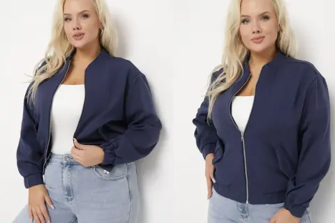 Kobieta plus size w granatowej kurtce bomberce, idealnej na co dzień.