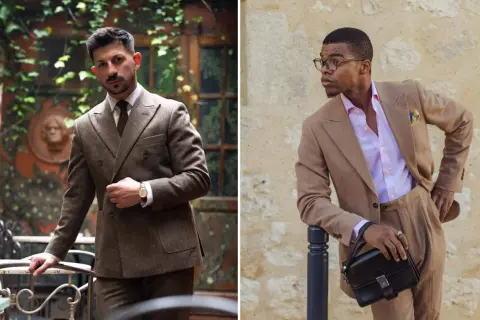 Zwei Männer in eleganten Anzügen. Einer trägt einen braunen Tweed-Anzug, der andere einen hellbraunen Leinenanzug mit pinkfarbenem Hemd. Vielfalt bei den Anzug Farben.