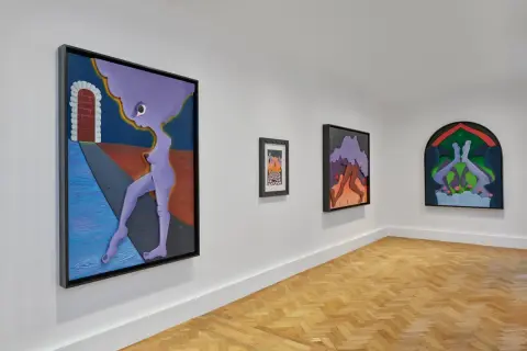 Gallery wall featuring surreal artworks by Alexandria Smith, including a purple figure by a brick archway and abstract forms.