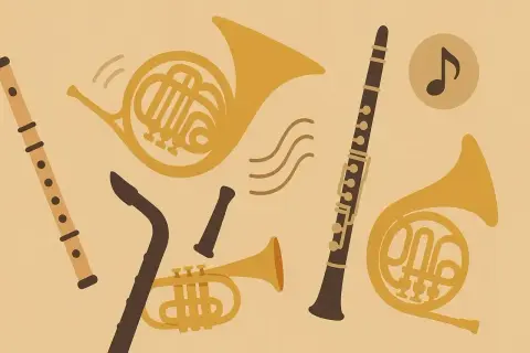 Małe instrumenty muzyczne: flet, klarnet, trąbka i dwa rogi. Dźwięki unoszą się w powietrzu.