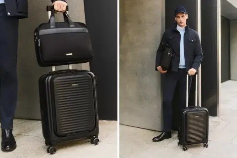 Elegancka, czarna walizka kabinowa i torba podróżna – idealny zestaw, jaka walizka do samolotu dla stylowego podróżnika.