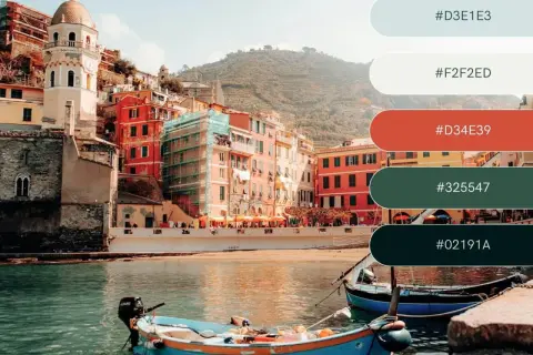 A vibrant Italian coastal town with colorful buildings and boats, showcasing a perfect vacation color palette of blues, reds, and greens.