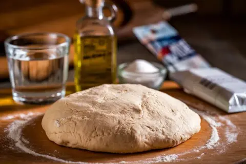 Réussir sa pâte à pizza maison : Secrets de pro pour une texture parfaite