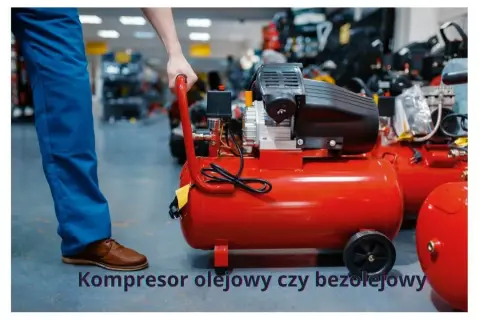 Czerwony kompresor olejowy czy bezolejowy? Mężczyzna w niebieskich spodniach przygotowuje się do pracy z urządzeniem.