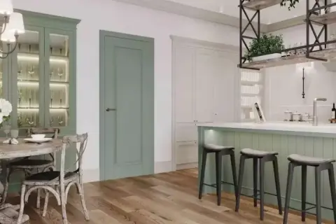 Elegancka kuchnia z wyspą w kolorze fango, która świetnie komponuje się z drewnianą podłogą i białymi meblami.