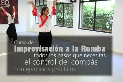 Mujer bailando flamenco con falda negra y blusa de lunares rojos. Aprende el ritmo de rumba flamenca y el control del compás.