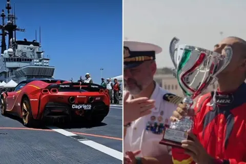 Fabio Barone festeggia una vittoria con un trofeo, mentre un'auto sportiva rossa sfreccia su una nave.