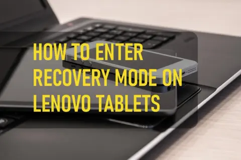 Jak zresetować tablet Lenovo? Na zdjęciu widać tablet i smartfon na klawiaturze laptopa, z tekstem "HOW TO ENTER RECOVERY MODE ON LENOVO TABLETS".