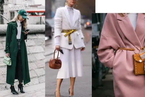Trzy kobiety prezentują różne style ubioru: elegancki płaszcz w kolorze butelkowej zieleni, biały zestaw z futrzaną marynarką i żółtym paskiem, oraz różowy płaszcz z ozdobnym paskiem i torebką.
