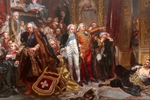 Malarstwo historyczne przedstawiające dramatyczną scenę z udziałem szlachty i wojskowych. W centrum uwagę przykuwa postać w czerwonym stroju, wskazująca palcem.