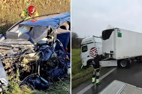 Wypadek na Pomorzu: strażak bada zniszczony samochód, obok ciężarówka z naczepą na poboczu.