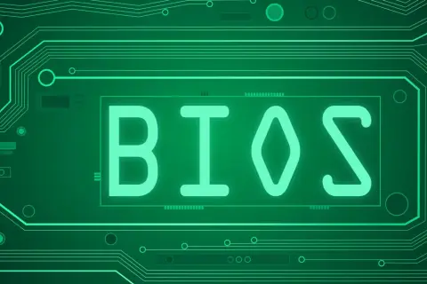 Zielona płyta główna z napisem BIOS. Aktualizacja BIOSu to ważny proces.