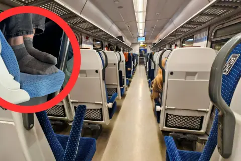 Nogi w skarpetkach na siedzeniu w pustym wagonie. Czy to pociąg do łodzi?