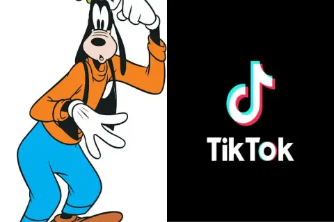 Goofy w pomarańczowej bluzie i niebieskich spodniach, obok logo TikTok. Goofy ahh, jakby tańczył do viralowego trendu.