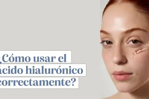Una mujer joven recibe gotas de ácido hialurónico en su cara. El texto pregunta: "¿Cómo usar el ácido hialurónico correctamente?".