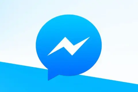 Niebieska ikona Messengera z białym błyskawicą. Idealne miejsce na gry na Messengerze i rozmowy.