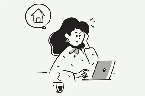 Mujer preocupada frente a un portátil, pensando en un anexo de contrato de alquiler para quitar inquilino.