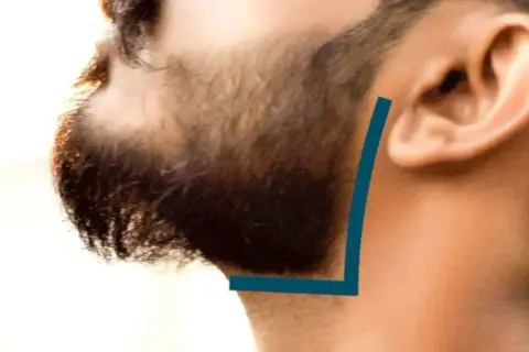 Un homme se fait tailler la joue barbe. Une ligne bleue indique la coupe parfaite.