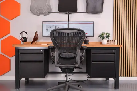 Ergonomiczne biurko dla wysokiej osoby z dwoma monitorami i wygodnym fotelem. Idealne do pracy i nauki.