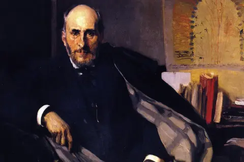 Retrato de Ramón de la Sagra, hombre de barba y traje oscuro, sentado con libros detrás.