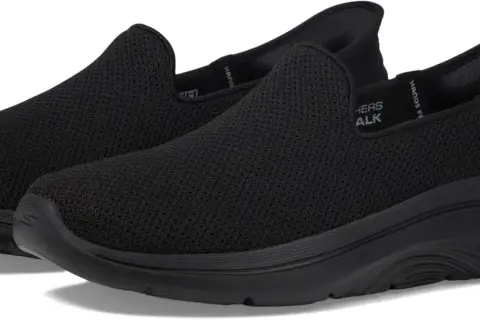 Zapatillas negras Skechers Arch Fit 2.0, cómodas y fáciles de poner, ideales para caminar.