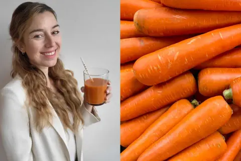 Frau mit Karottensaft und ein Haufen Karotten. Sie genießt jeden Tag eine Karotte für ihre Gesundheit.