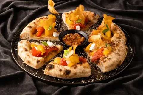 Pizza gourmet co to? Poznaj wyjątkowe smaki i składniki tej pizzy