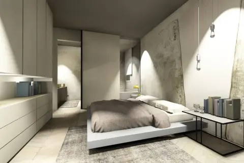 Camera da letto moderna con un elegante bagno in camera. Arredamento minimalista, luci soffuse e un'atmosfera rilassante.