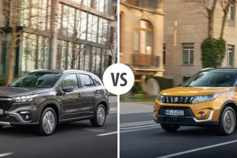Szary i żółty suzuki suv jadące po ulicach miasta.